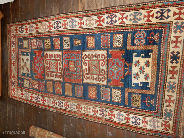 OLD KAZAK THAT NEEDS SOME REPAIRS - VERY GOOD TRIBAL IMAGES TOP AND BOTTOM
VERY GOOD RICH DYES
$1300