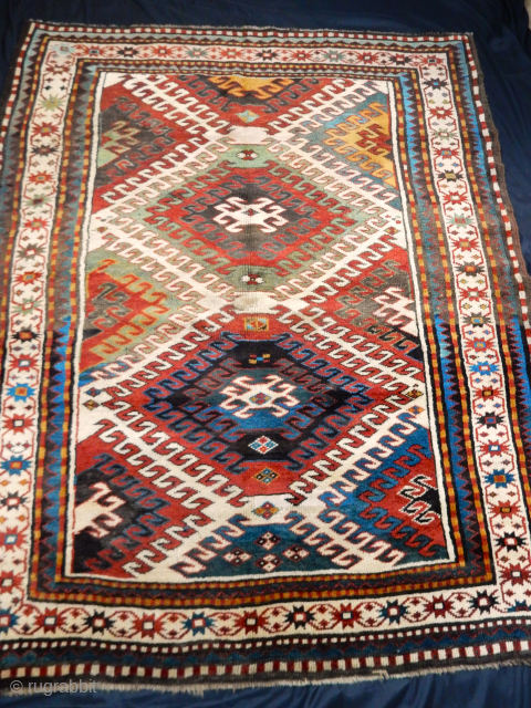SMALL 50 X 60 INCH KAZAK RUG WITH FULL PILE AND CLASSIC DESIGN
BOYLSTON ASSOCIATES ANTIQUE CAUCASIAN RUGS .COM
WE OFFER A FULL REFUND FOR ANY REASON WITHIN 2 DAYS