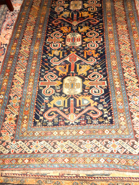 KUBA LONG RUG IN EXCELLENT PLUS PILE AND CONDITION .A FINE EXAMPLE .

SIZE OF 47 X 117 INCHES WITH COMPLETE SIDES AND ENDS  $9500

BOYLSTON ASSOCIATES ANTIQUE CAUCASIAN RUGS .COM   