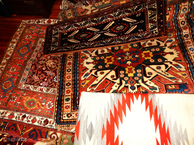 RUGS RUGS RUGS 
EAGLE KAZAK WITH BEST GREEN DYE USED FULL PILE WITH SOME STAINS
IVORY AND MADDER NAVAJO RUG IN GREAT CONDITION
A+ VERAMIN TRAPPING 
AND A REALLY LOVELY FULL PILE BIJAR BIDJAR  ...