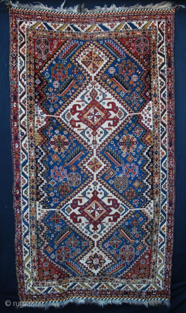 A beautiful 19th century Qashqa'i Rug 2.14m x 1.22m (7'x 4')with a number of old re-weaves requiring new restoration. Good natural colours and in overall good condition with some slight wear. Found  ...