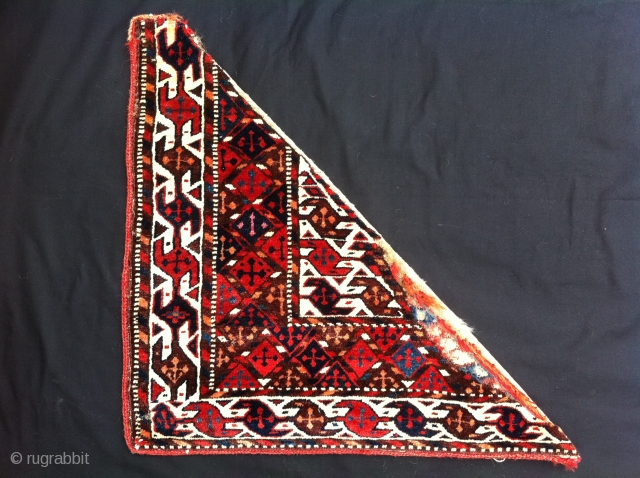 A quarter panel of a 19th century knotted-pile Yomud Turkmen Bokche in very good condition with the remains of its original plain-weave back. The colours are all vegetable.     