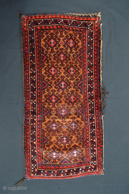 Baluch balisht in excellent condition, complete with plain-weave back - 89 x 43cm (2' 11" x 1' 5").               