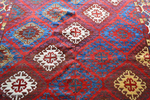Rare Khirgyz carpet in square format. Good overall condition with some minor wear and brown-dye corrosion. 2.44m (8') square.              