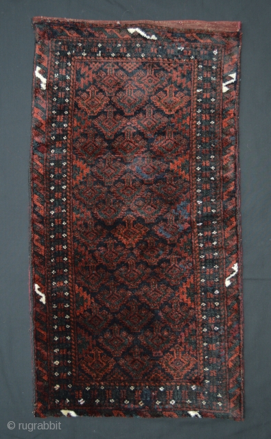 Baluch Balisht (pillow-bag), Mushwanni tribes, south-east Persia.
Complete with red plain-weave back and in good pile all over bar a couple of tiny re-weaves.          