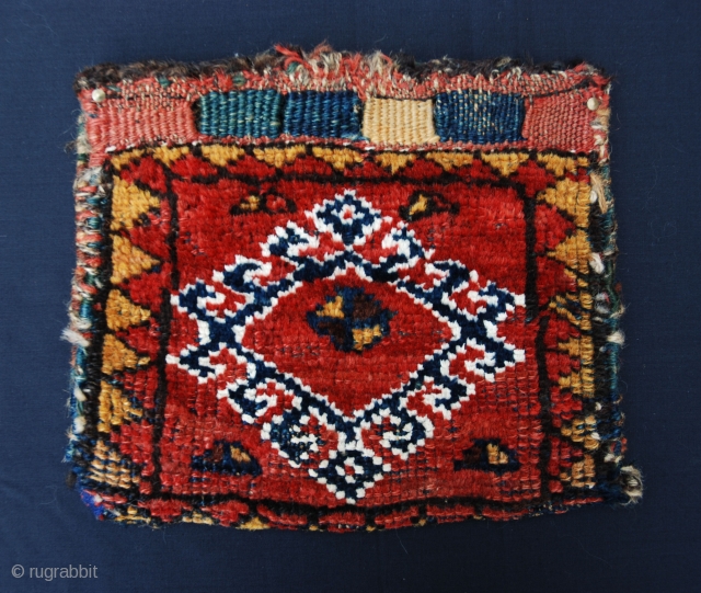 Tiny Chanteh, Lori-Bakhtiari tribes, in good condition with some wear in places. The bag retains its original plainweave back in narrow horizontal bands of colour. 19th century. Size: 25cm x 20cm (10"  ...