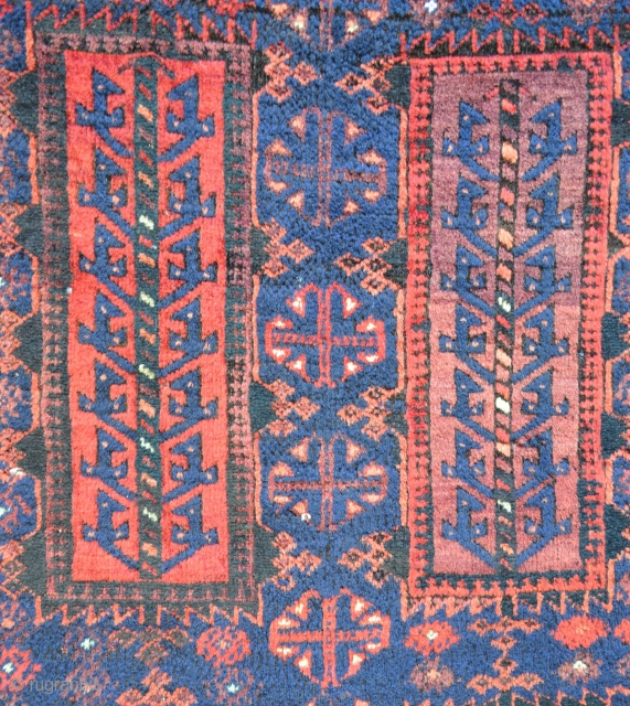 Fabulous indigo-blue, full-pile, glossy wool Timuri rug in excellent condition and complete with brocaded skirts circa 1890-1900. 1.98m x 1.10m (6' 6" x 3' 7").        
