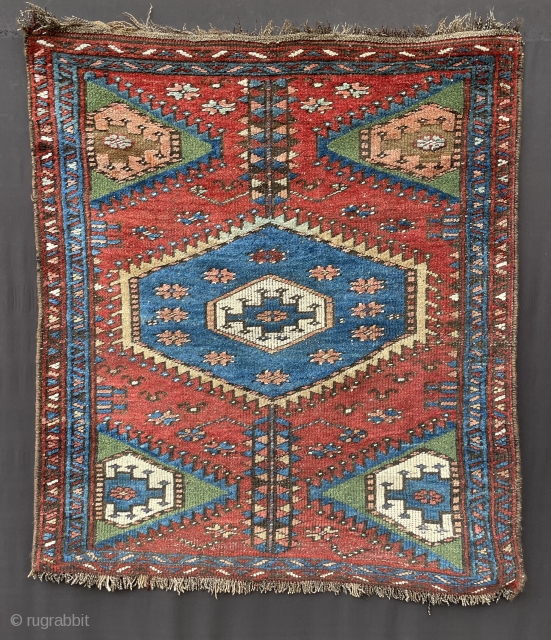 Interesting and unusual 19th century Kurdish rug in good but evenly-low pile all over.
Great natural colours and fairly coarse weave - a truly tribal rug in every sense.
1.30 x 1.14m (4’ 3”  ...