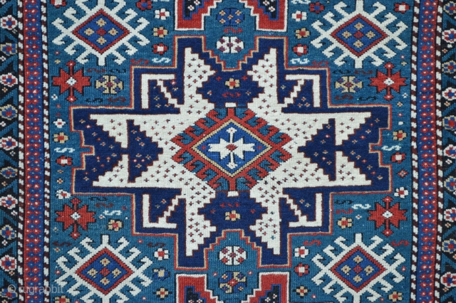 Antique east Caucasian Lesghi rug with aqua-marine field (not blue) in good overall condition 1.42m x 1.04m (4' 8" x 3' 5").           