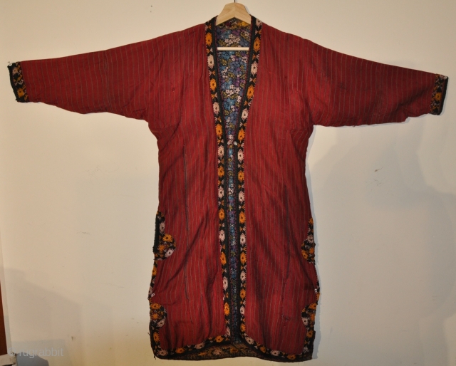 Antique Tekke TURKMEN Embroidered Silk Cloth Chapan Chirpy Robe Coat

Fine antique Tekke Chapan made from finely-woven silk fabric lined with printed cotton trade cloth.  Extensive silk embroidery silk embroidery on arms,  ...
