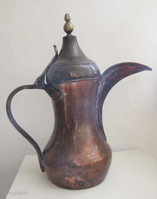 Arabian Gulf Coffee Pot (Dalla). Early 20th C. Copper & Brass. Height 35 cms                   