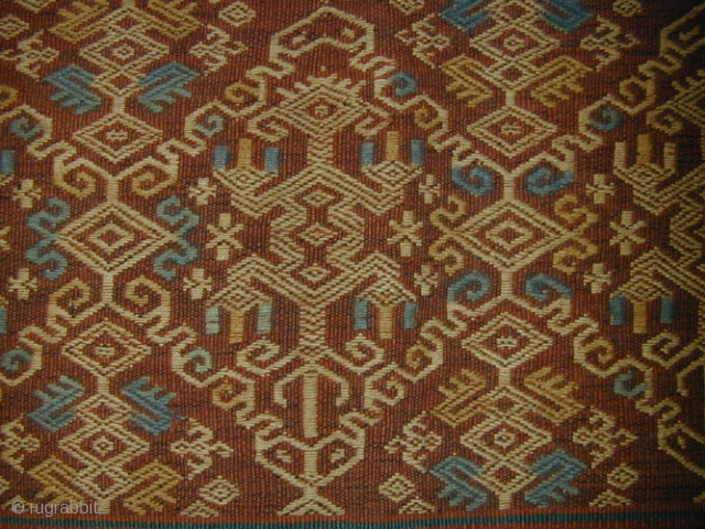 Ceremonial Sash with Zoomorphic Figures. East Sumba, Indonesia. Handspun cotton - supplementary warp weaving with painted over details. 166 x 32 cms. Mid-20th c. or earlier.       