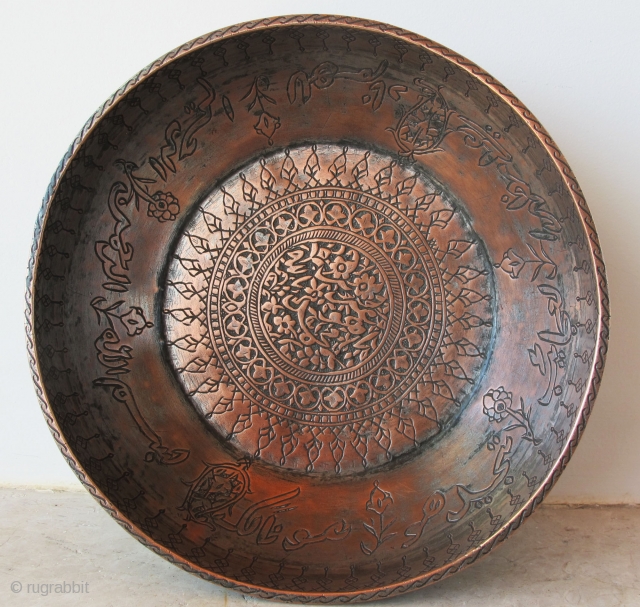 Dervish Divination Bowl.Possibly Halidiyya Dervish order. Khorassan. Mid-19th C. Tinned copper. H 6 cms D= 19 cms‏ 

The Bowl is inscribed in ARABIC  in an incantational mode 
 
Central medallion:
 
  ...