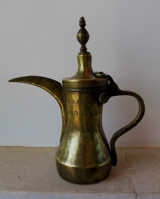 Brass Coffee Pot (Dalla). Dated 1945, Syria.  Made by dalla master maker Ali Daydar and dated 1945 (seal and date on both sides) which corresponds to the French Mandate period. It  ...