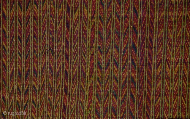 Cambodian Silk Ikat Sampot Hol. Circa 1900. Very good condition and excellent colours. 87 x 330 cms.                