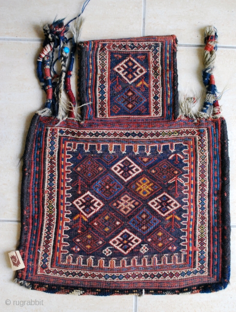 Antique Bakhtiari namakdan (salt-bag)in soumak technique, ca. 1900, 49 x 60 cm. Very slight gouge/repair to corners otherwise in very good condition.           