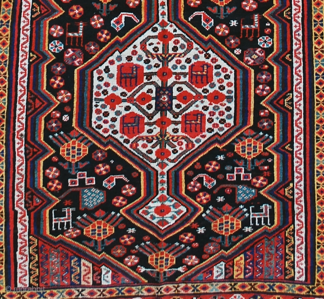 Luri rug, late 19th c. 145 x 338 cm. Brilliant saturated and contrasting colors and very pleasent design. Low pile to lower end but not dramatic. Nice checkered polychrome end kilims. Good  ...