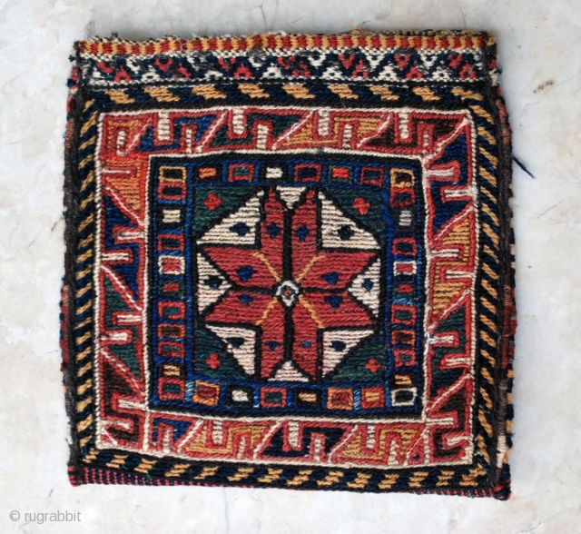 Beautifull Khamseh small bag in soumak technique, ca. 1940, 27 x 26 cm (11" x 10"). Bold central 8-pointed star design. All natural colors in excellent condition      