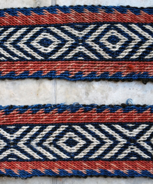 Bakhtiari pack-band, all wool, early 20th c. 8 x 328 cm. Good condition in general. One small braided rope missing at one end.          