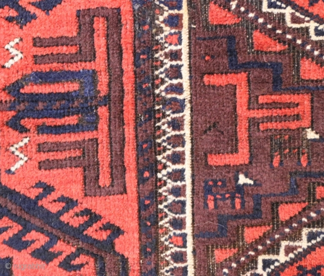 Antique plum ground Baluch, 87 x 162 cm (1'11" x 5'5") incl.end kilims. 2 quite small good repairs, browns corrosion, good condition otherwise.          