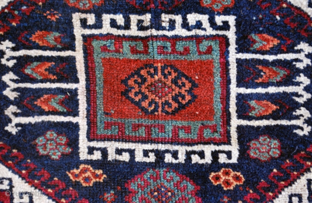 East Anatolian, early 20th c. 123 x 210 (4"1' x 7'). Uneven corrosion of ground color. Small repiled areas, small reweave at upper end (braid), secured at lower. Original selvages.   