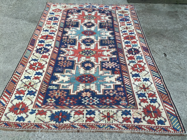 19thc Lesghi Star Rug Excellent condition for Age wonderful natural colours.
82inches x 52inches                    