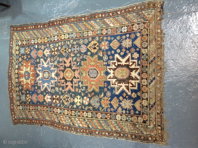Antique lesghi star design shirvan carpet, 253x166cm, country house find, showing some dye erosion and repairs.                 