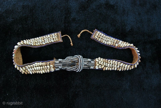 Africa!
Kuba PEOPLE BELT. RAFFIA, COWRY SHELLS. GLASS BEADS.
Kuba people belt (mukody mu-ikup lakiing). Democratic Republic of Congo. First half 20th century. A wonderful tribal art example made of raffia, cowry shells and  ...