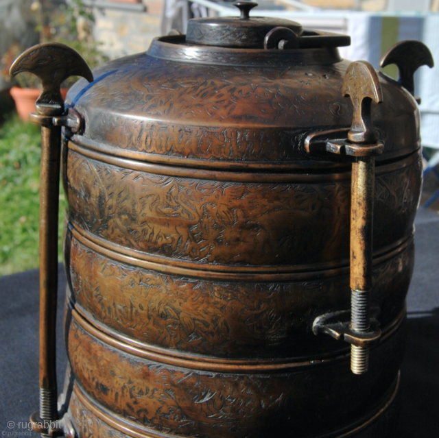 Beautiful, very rare Osmanli work of art.
Ottoman 19th century or earlier brass safertas or food container. Cm 17x23h. Heavily decorated. Really rare & wonderful. IN very good condition. Few similar examples found  ...