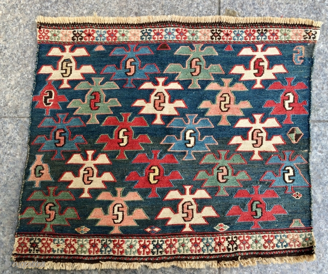 Unusual & beautiful pattern in this, most probably a 
Shahsavan Moghan, 
flat weave mafrash end panel.
Size is cm 45x50 ca.
Age could be end 19th, early 20th century.
Stylized "mother nature" with a very  ...