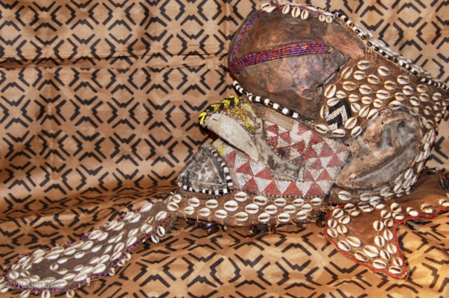 Royal Kuba Elephant Mask Congo. 
Size is cm 34 h, 36 w and 23 deep. 
Weight is a bit over Kg 2. Datable 1940/1950. Wood, cowry shells, copper, iron, fabric, beads. Actually  ...