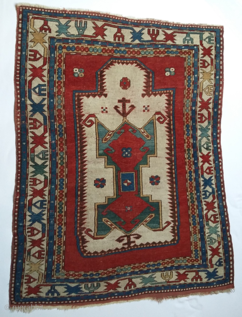 Kazak Frog rug

Known as Lori Pampak and sometimes attributed to the Fachralo village.
The dimensions are: cm 140h, width 107 at the top and 115 at the bottom.
Similar rugs were published by some  ...