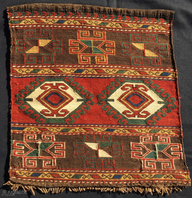 Shahsavan sumack mafrash panel. 
Cm 46x50. 
Mafrash end panel or a khorjin bag face? 
End 19th c. 
Hypnotic eye dazzler 
Fantastic saturated colors, 
great archaic pattern, 
in good condition,…..
an eye candy, a  ...