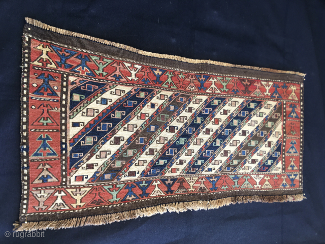 Shahsavan Moghan Sumack mafrash side/long panel. Size is cm 45x100 ca. Datable 1880/1890. The Shahsavan loved to use the moharamat/stripes pattern, in different variations. Here, in this panel we have diagonal moharamat  ...
