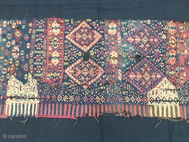 Van, Eastern Anatolia, kilim fragment. Cm 72x176. Datable 1880/1890. Great, wild pattern. Lovely colors. In bad condition, with holes, tears, etc., but still highly enjoyable. I would suggest to have it professionally  ...