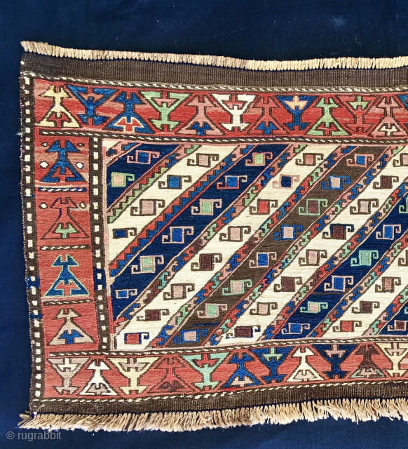 Shahsavan Moghan Sumack mafrash side/long panel. 
Size is cm 45x100 ca. 
Datable 1880/1890. 
The Shahsavan loved to use the moharamat/stripes pattern, in different ways. Here we have diagonal moharamat pattern which is  ...