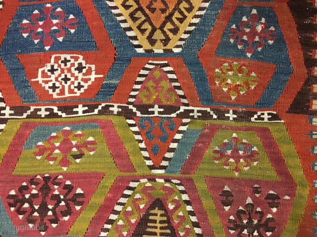 No, not simply another kilim strip! This is a special one, with incredible natural deeply saturated colors, a very interesting pattern, ....cotton, color inlets here and there...get a good look at it.....  ...