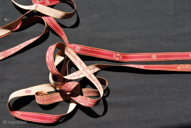 SASIGYO. Burma/Myanmar. "Woven words" (sasigyo or sarsekyo - sanskrit: "100 words") ‘sazigyo’ were tablet-weaving of text woven tapes or ribbons used for binding the leaves of palm-leaf manuscripts. 
“Sasigyo” is a Burmese  ...