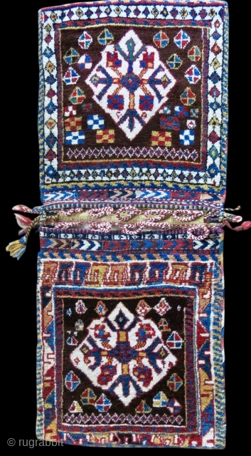 Qashqai collectors item. This is imho a very rare and beautiful Qashqai Gabbeh pattern type khorjin/saddle bag. Cm 50x125 ca. Datable back to 100/110 years. The rarity is first of all in  ...