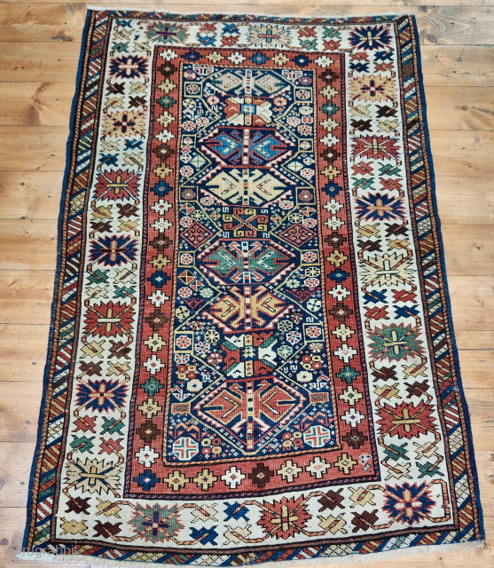 Caucasian small and rich pile rug from the Ghendje area, Azerbaijan.
The size is cm 95x145. 
Age is credited as end of 19th century or slightly earlier.
This small rug is very rich in  ...