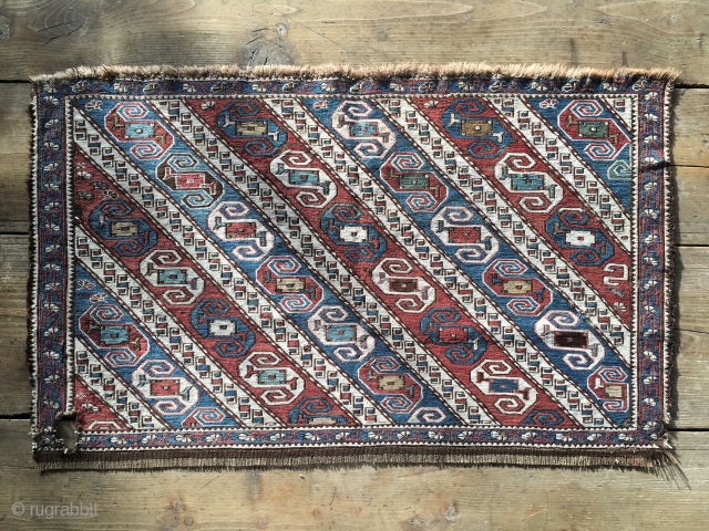 Dragon sumack mafrash panel. Khyzy village, north of Baku. Rare & beautiful. Cm 62x102. Late 19th c. Wonderful soft colors. Condition issues: one hole, lower border needs conservation. A few days ago  ...