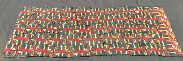 Tekke silk black chapan fragment.
Cm 36x90
Datable 3rd/4th q 19th century
Condition issues: holes and tears
Silk on silk
Background is black, embroidery red, yellow, orange
Great embroidered workmanship.
Email carlokocman@gmail.com

        