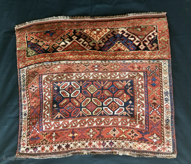 Watch the Dragons in the cage! 
Lori/Bakhtiari imho, but it could well be Qashqai.......or? 
Sumack & pile weaving.
Size is cm 88x102 
Interesting pattern with dragons in the central field, or? 
Is it  ...
