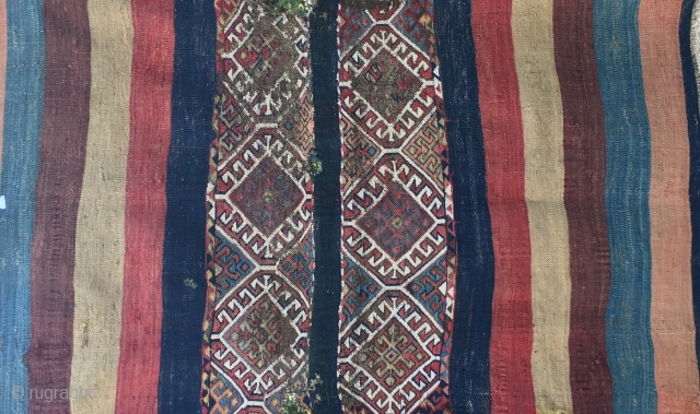 South East Anatolian open cuval. Cm 95x145 ca. Late 19th c. Middle part in bad condition, while the striped wings have wonderful natural colors.         