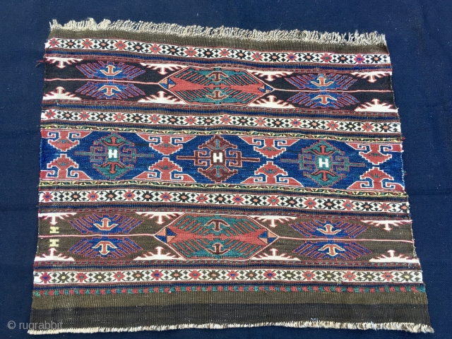 Shahsavan Eagle sumack mafrash end panel. Cm 44/49X57. Datable 1880/1890sh. Rare eagle pattern. Very fine and very very tight weave. White is cotton. The colors are magnificent, natural and deeply saturated: chestnut,  ...