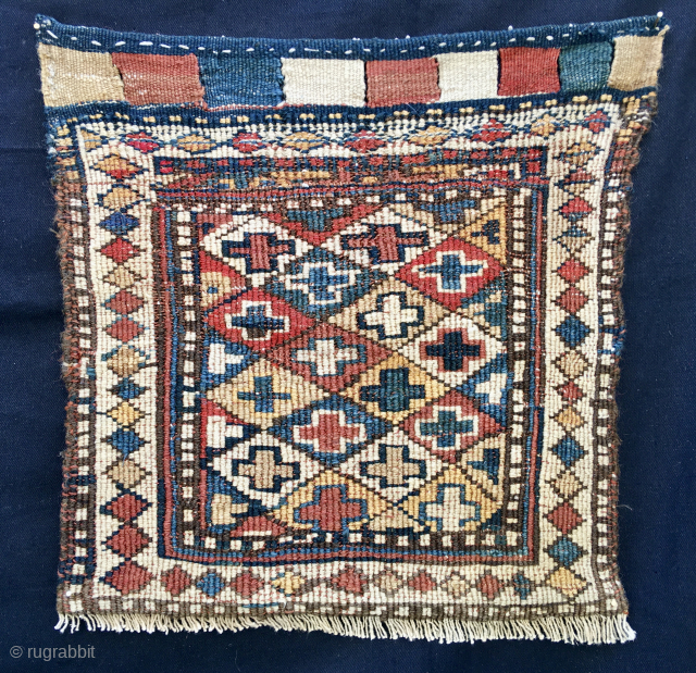 SHAHSAVAN SUMACK HASHTRUD/MIYANEH BAG FACE
CM 46X48
3rd quarter of the 19th century
Diamond lattice with repeating cruciform motif.
Sumack weave with extra weft wrapping
Great natural colors with all kind of them, from madder reds to  ...
