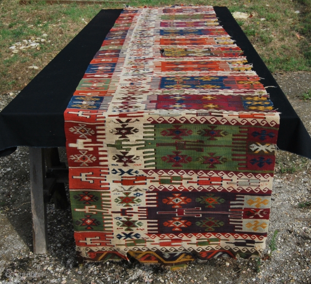 East Anatolia kilim strip. Cm 86x376 ca. First half 19th century. Wonderful colors, great pattern. Tears, holes, old moth problem, but still in good condition and definitely a fantastic piece, …..a museum  ...