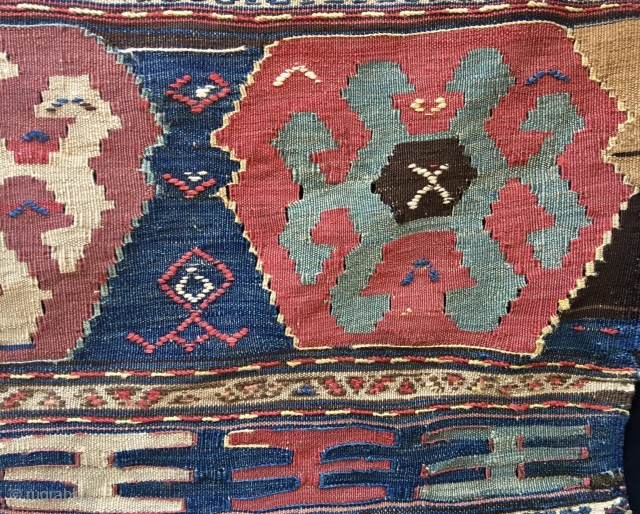 Shahsavan rare design kilim mafrash long panel.
Cm 50x105 ca.
Datable 1870/880.
Great pattern with 3 big medallions, top and bottom lovely finger strips.
Colors are fantastic, natural, deeply saturated. In good condition.

Please email carlokocman@gmail.com
  