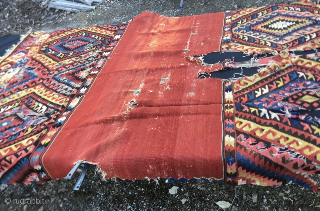 19th Century Fethiye camel cover kilim fragment. Cm 145x235. Antique, beautiful & rare. Distressed but powerful, very powerful. Still "alive", speaking! Needs either a loving collector or a skilful restorer. Great colors  ...