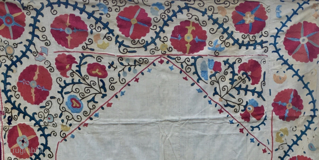 Extremely beautiful Suzani Kapunuk or wall/door hanging. 
Cm 142x216. 
Late 19th century, or even earlier. 
Pure natural silk on cotton. 
Wonderful natural colors. Plenty of indigo and madder nuances.
Great workmanship.  
Some  ...